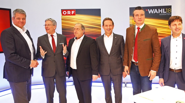 Gerhard Köfer (Team Kärnten), LH Peter Kaiser (SPÖ), Rolf Holub (Grüne), Christian Benger (ÖVP), Gernot Darmann (FPÖ) und Markus Unterdorfer-Morgenstern (NEOS).