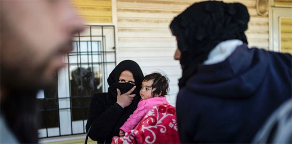 Flüchtlingsfamilie an der syrisch-türkischen Grenze