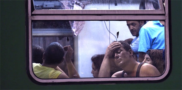Flüchtlinge in einem Zug