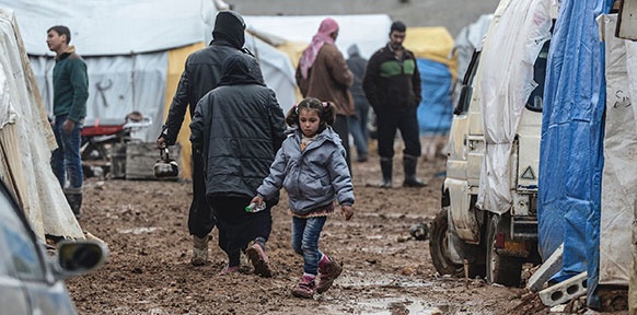 Syrisches Flüchtlingslager nahe der türkischen Grenze, Matschboden