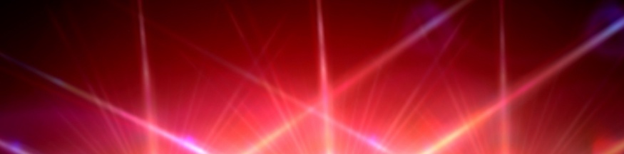 Bühnenlicht: Hell leuchtende Lichter, die rote und gelbe Strahlen mit Lens-Flare-Effekten aussenden