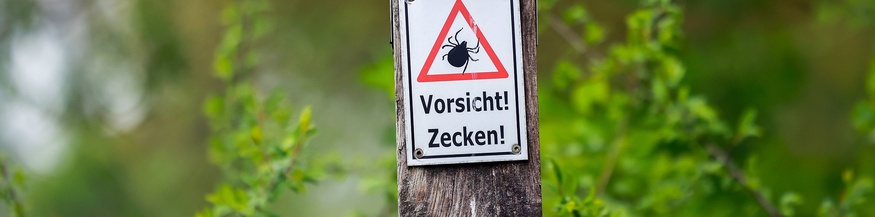 Zecken-Warnschild