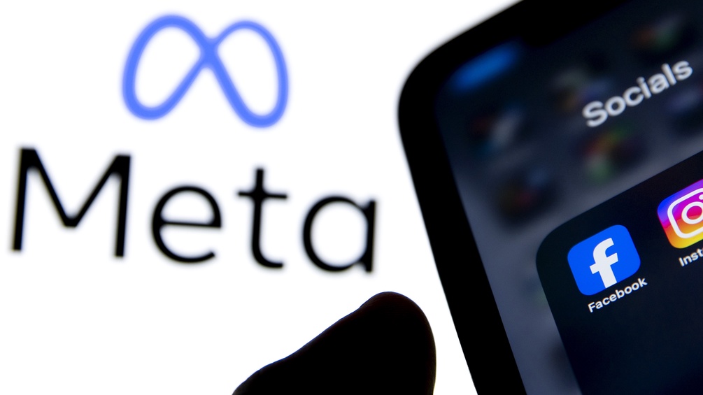 Meta-Logo und Smartphone