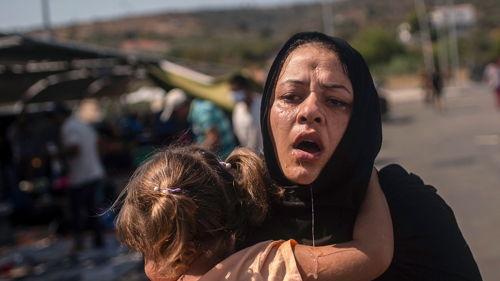 Frau mit Kind in Flüchtlingscamp