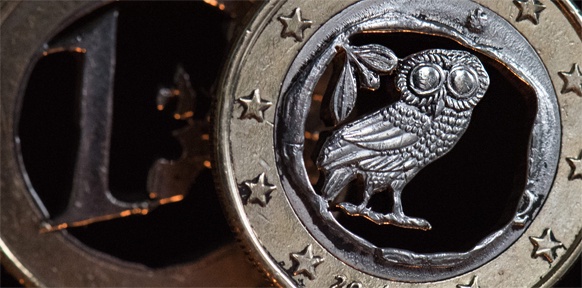 Löchrige Euromünze mit Eule