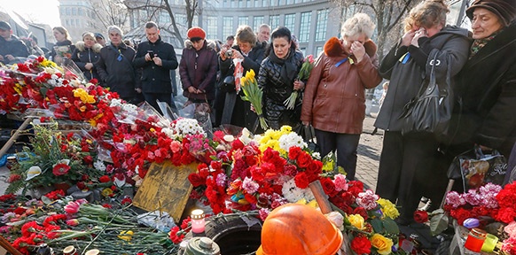 Trauernde Menschen in Kiew