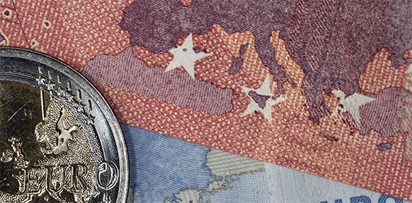 AFP/ARIS MESSINIS Euro-Münzen und -Scheine