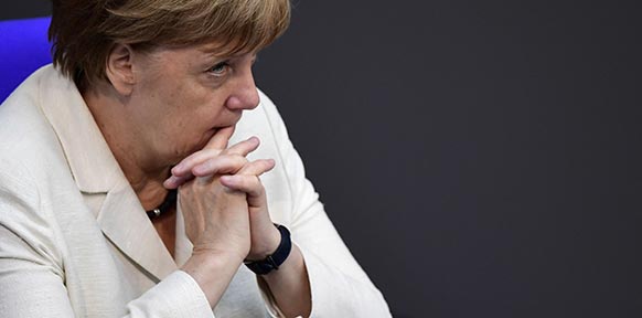 APA/AFP/JOHN MACDOUGALL Angela Merkel