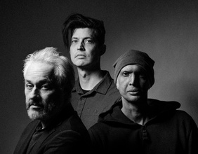 Ceramic Dog: Marc Ribot- guitar/vocals, Shahzad Ismaily- bass, Chess Smith- drums.